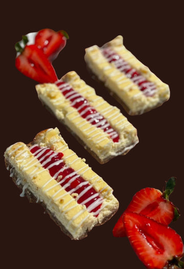 Cheesecake Strawberry Philadelphia Bars with White Chocolate Drizzle